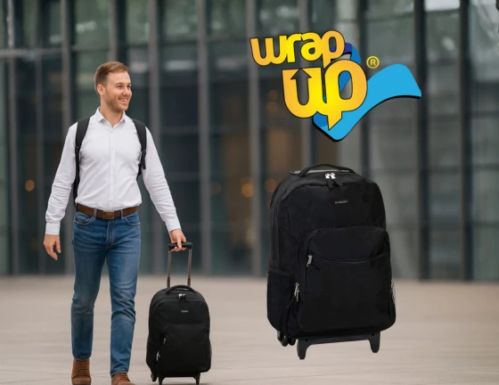 Adult traveler pulling a rolling suitcase for college travel in an airport setting