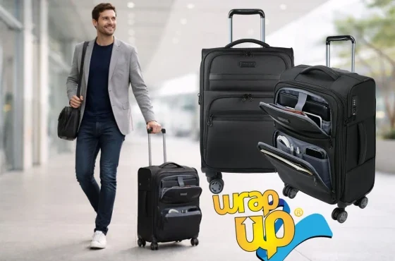 Adult traveler walking through an airport using a rolling suitcase with front laptop compartment, shown full body with clean background