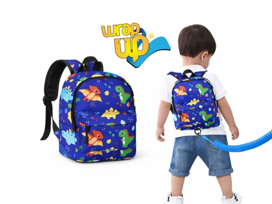 Toddler backpack with safety leash shown from front and back, compact travel option often compared to a rolling suitcase for family trips