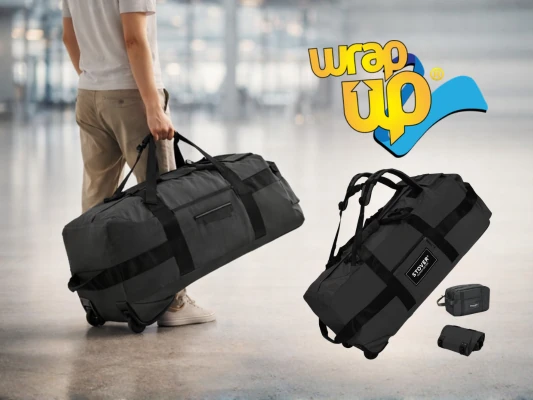 Person carrying rolling duffel bag in airport, best long travel luggage option for extended trips