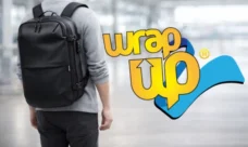 Traveler using best backpack luggage combo in airport, sleek carry-on backpack for smart travel