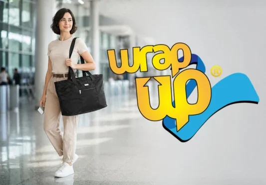 Traveler carrying the best packable travel tote in an airport terminal with extra storage space for trips