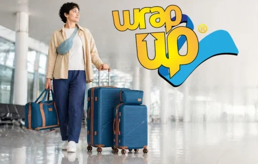 Traveler walking in airport with affordable luggage sets under 150 including suitcase and duffel bag