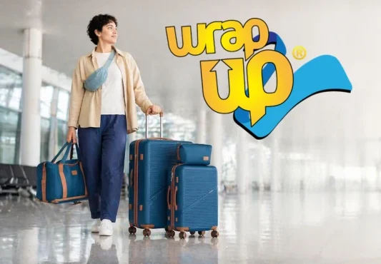 Traveler walking in airport with affordable luggage sets under 150 including suitcase and duffel bag