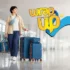 Traveler walking in airport with affordable luggage sets under 150 including suitcase and duffel bag