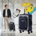 Man pulling a best carry-on garment suitcase in a modern airport terminal