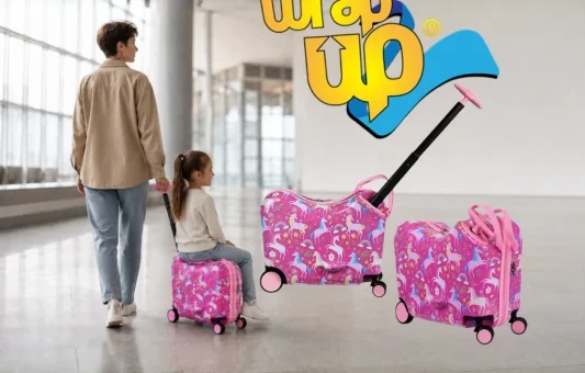 Girl riding kids ride-on luggage set while an adult pulls it through a modern airport