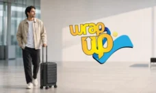 Traveler pulling expandable luggage with straps in a modern airport terminal