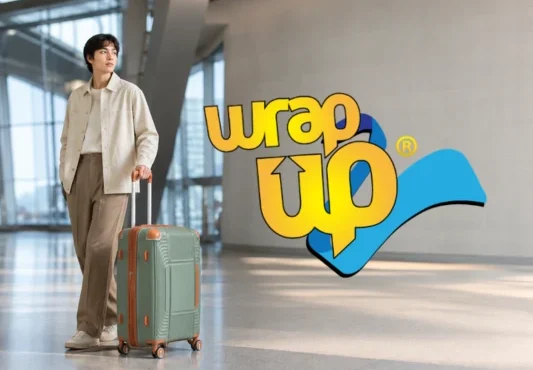 Traveler with durable luggage with reinforced corners in a modern airport terminal