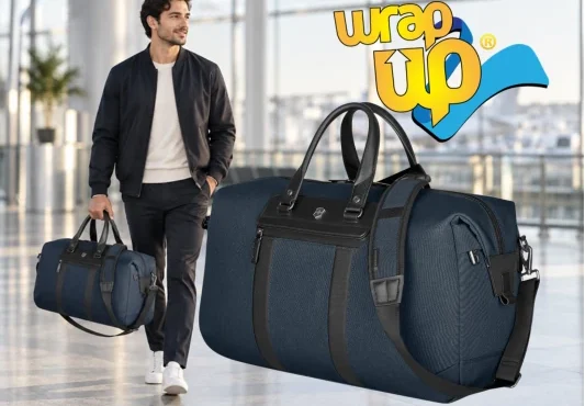 Traveler carrying a carry-on weekender bag through a modern airport terminal