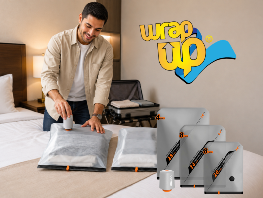 Traveler using compression travel storage bags on a bed while organizing clothes for a trip.
