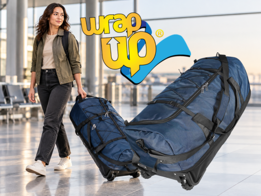 Traveler pulling a large wheeled duffel bag through an airport, ideal for durable duffel bags for travel
